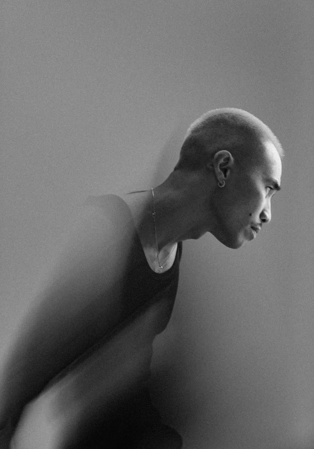 Editorial portrait, caught mid-motion